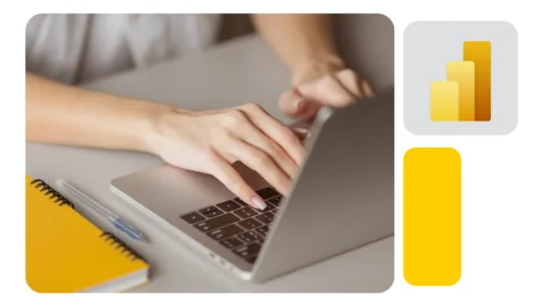 Mãos digitando em notebook sobre mesa clara, ao lado de caderno e caneta amarelos, com ícone do Power BI.